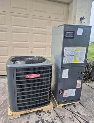 Goodman HVAC split system, including a condenser unit and an air handler installation in residential Lake in the Hills property (McHenry County)